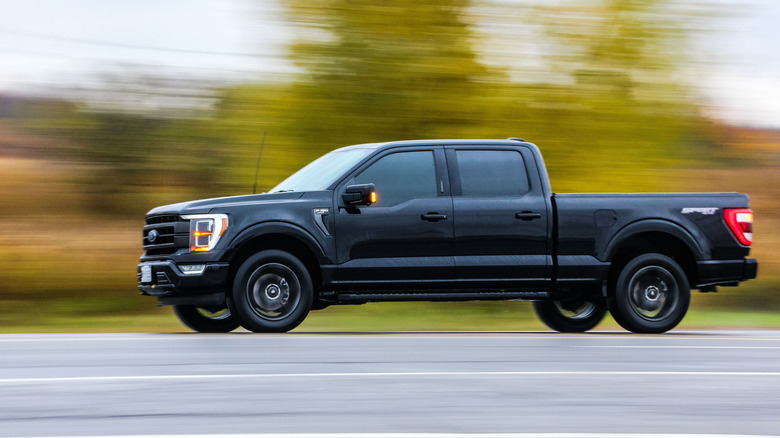 Ford F-150 speeding along a road