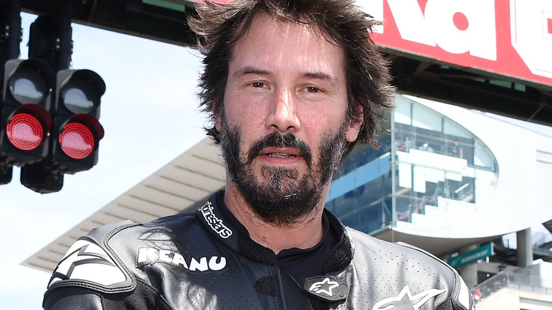 Keanu Reeves posing for photo