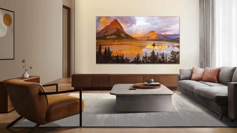 TCL TV mounted on a living room wall