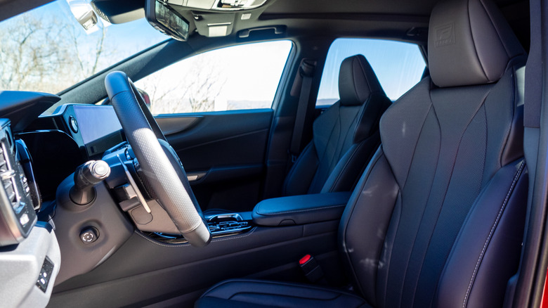 2026 Lexus NX 350h F Sport Handling AWD front seats, dashboard and steering wheel