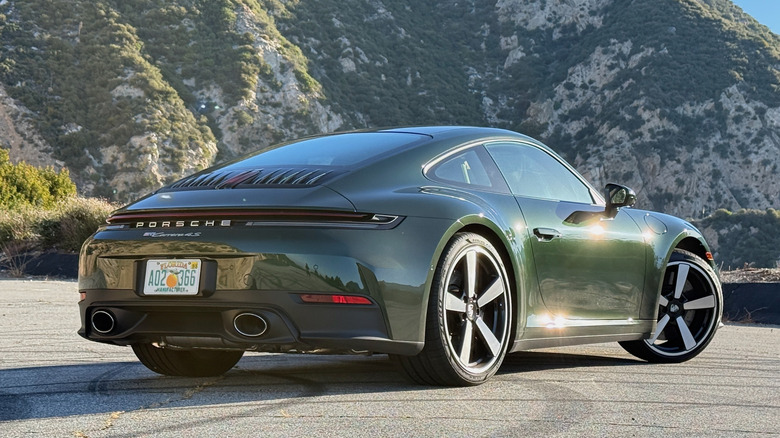 2026 Porsche 911 4S rear 3/4 parked in the mountains