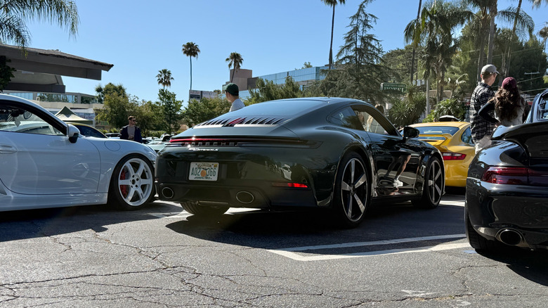 2026 Porsche 911 4S parked in a group of Porsches