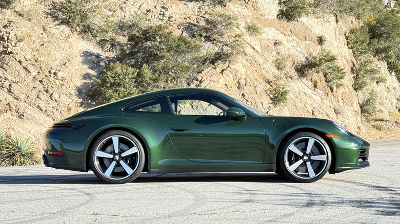 2026 Porsche 911 4S side profile parked in the mountains