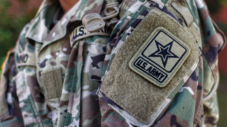 U.S. Army patch on the sleeve of a soldier in fatigues