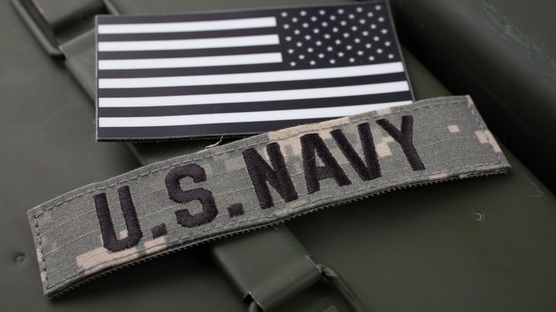 U.S. Navy and U.S flag patches  in black and white on ammo box