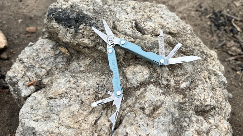 Micra Leatherman multi-tool on a rock