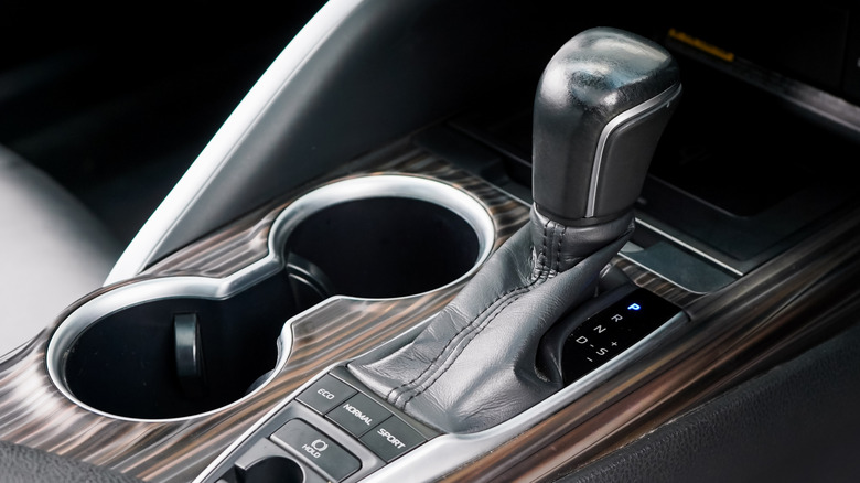An automatic shift selector in a car's interior