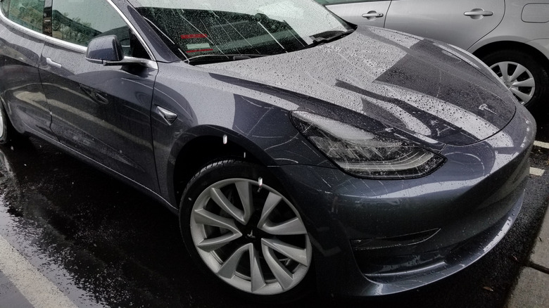Wheel view of a Tesla Model 3.