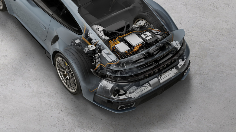 A cutaway of a gray Porsche 911 Turbo S powertrain