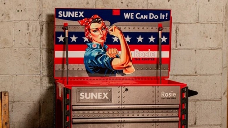 The top half of a toolbox, featuring a pic of Rosie the Riveter under the open top lid