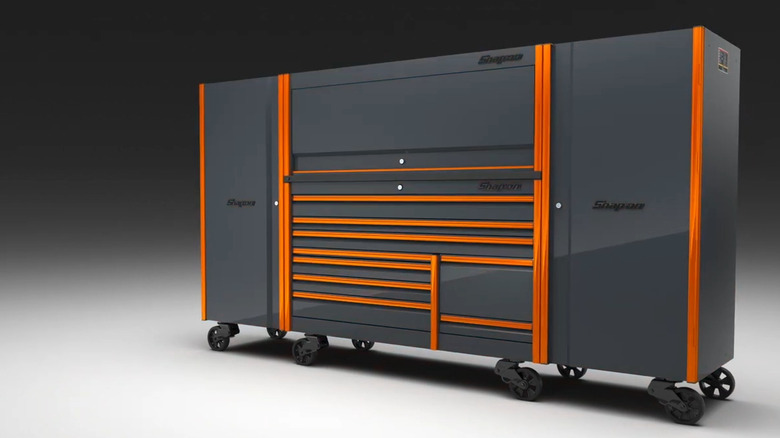A large Snap-On Tool chest in charcoal grey with orange trim