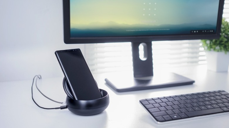 Samsung phone connected to a display and keyboard