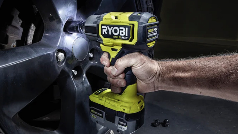 Ryobi 18V One+ 1/2-inch Impact Wrench in use on a tire