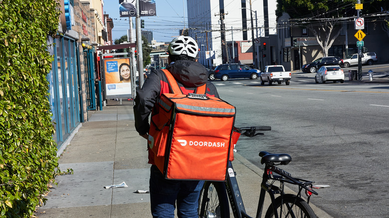 DoorDash dasher with bike