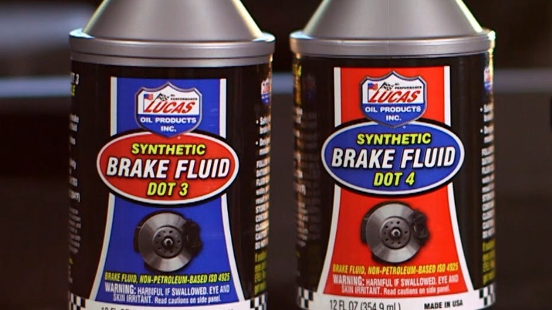 A picture of Lucas oil bottles of dot 3 and dot 4 brake fluid