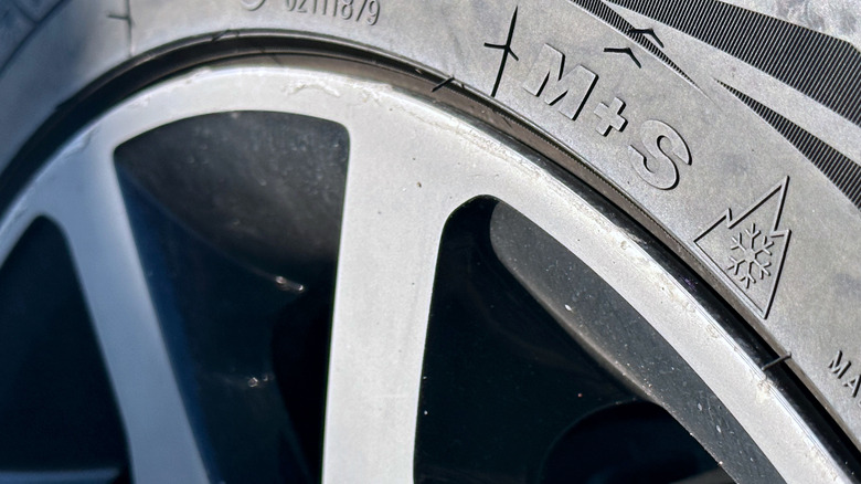 All-season tire marked with M+S logo