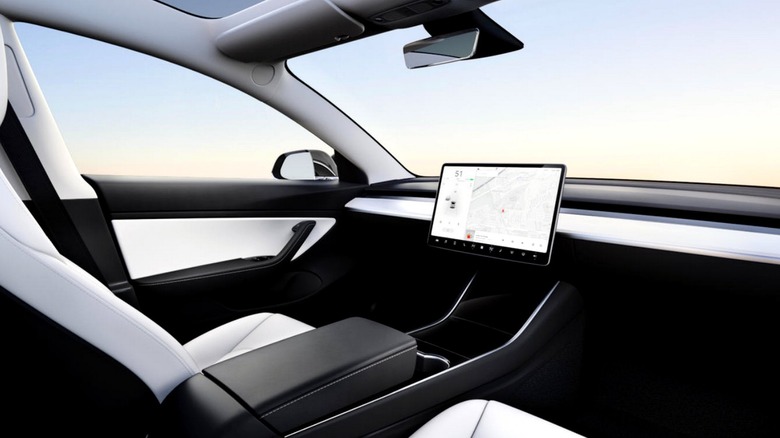 Tesla car concept lacking a steering wheel.