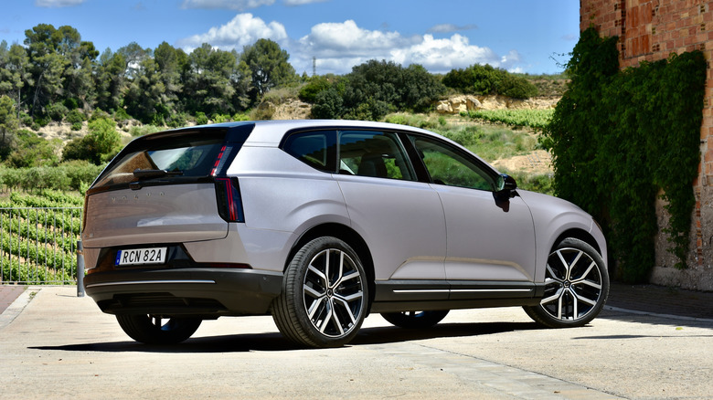 2027 Volvo EX60 rear quarter view.