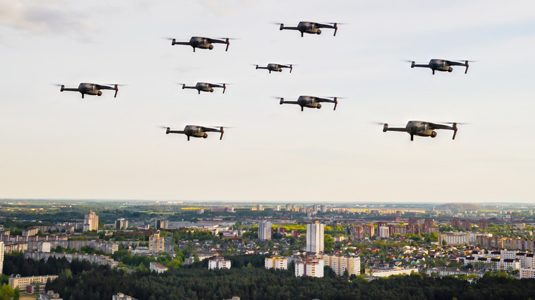 drone group fleet over city