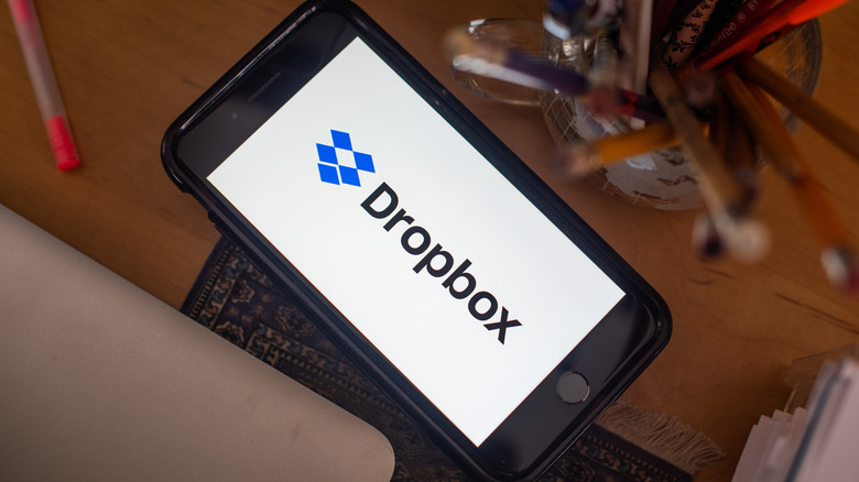 Dropbox logo on a smartphone screen.