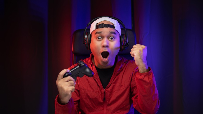 guy wearing headphones while gaming