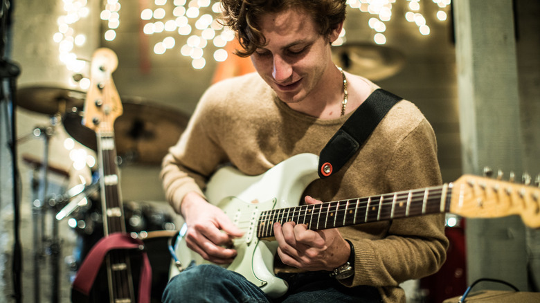 Man playing electric guitar