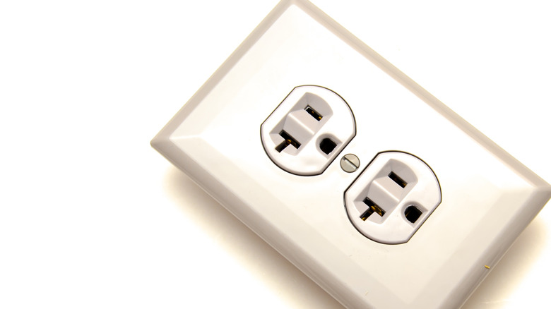 20A outlet with T-shaped hole