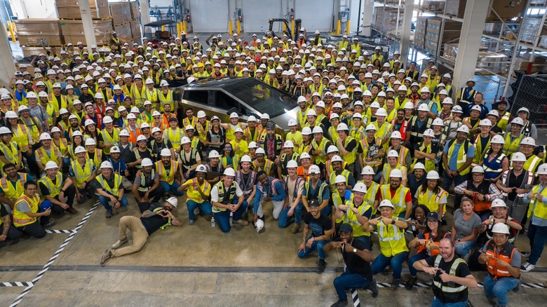 Tesla employees with Cybertruck 