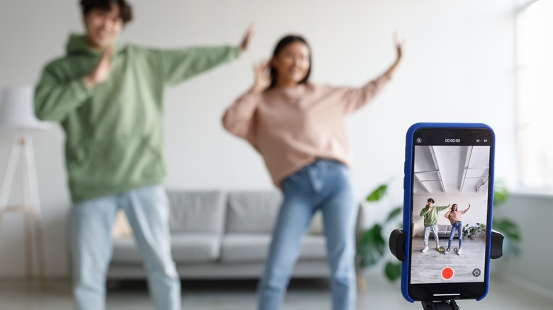 Teens filming dances