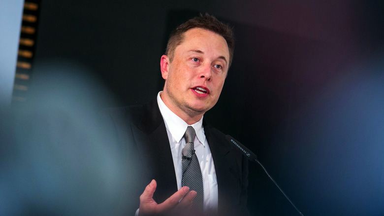 Elon Musk speaking at an event.