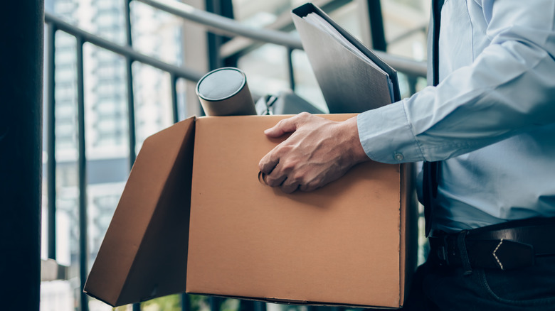 Laid off employee belongings in a box