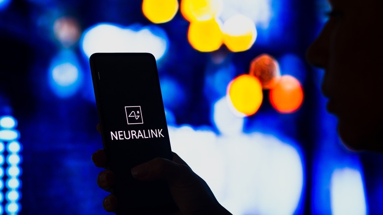 Neuralink logo on smartphone
