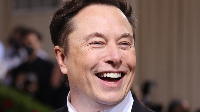 Elon Musk laughing 2022