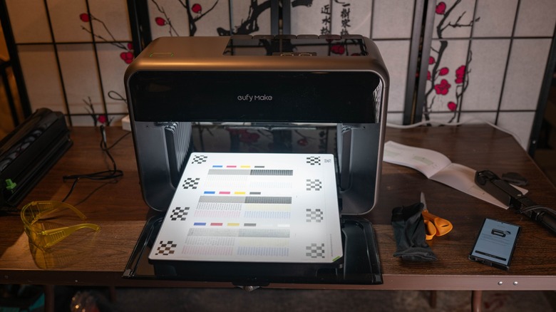 The Eufymake E1 in the process of calibrating the print head.