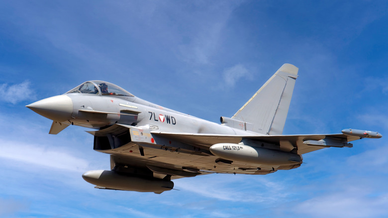 Eurofighter Typhoon flying level with a clear, blue sky in the background