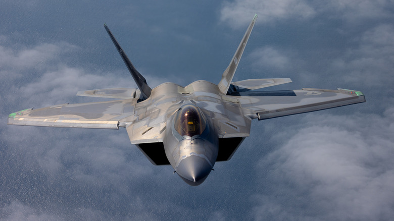 An F-22 Raptor photographed from another aircraft