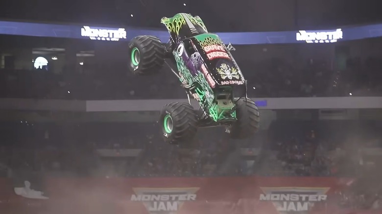 A monster truck flying through the air