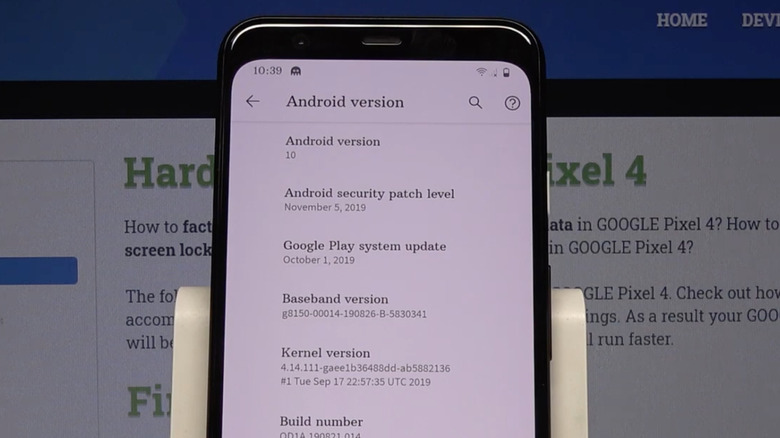 A Google Pixel 4 displays the About phone section within its Settings app