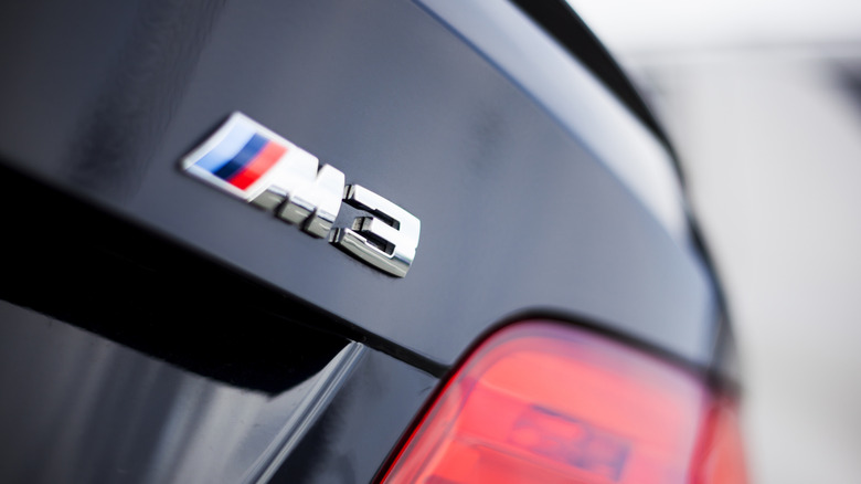 BMW M3 Badge on black car