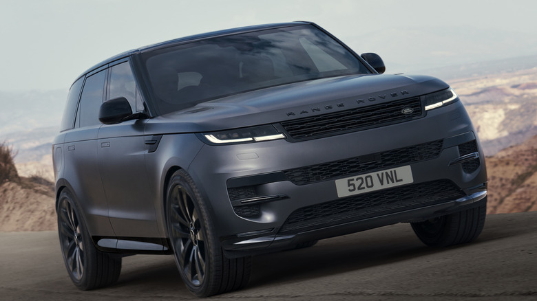 Black Land Rover Range Rover Sport in motion