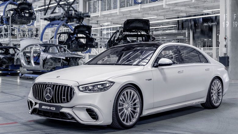 White Mercedes-AMG S63 E Performance parked on the factory floor