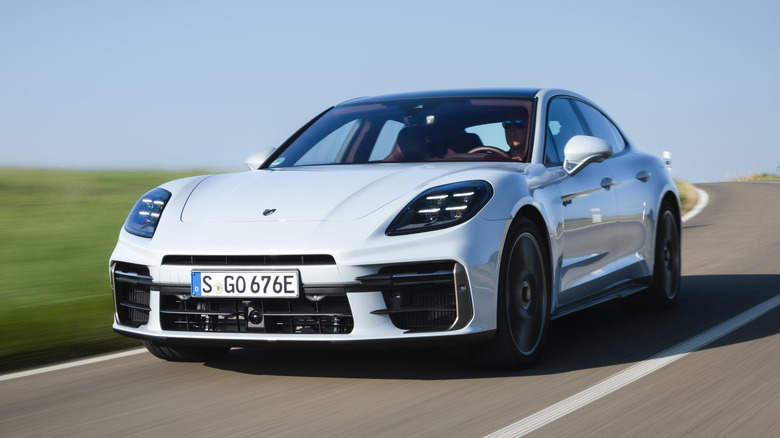 White Porsche Panamera Turbo S E-Hybrid in motion