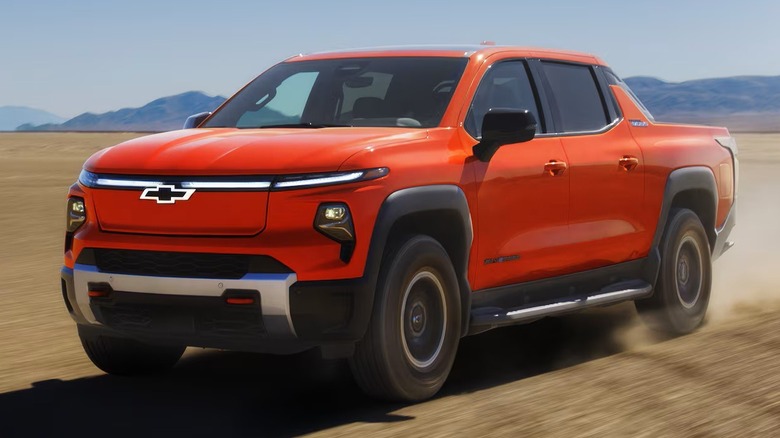 2026 Chevrolet Silverado EV driving through desert