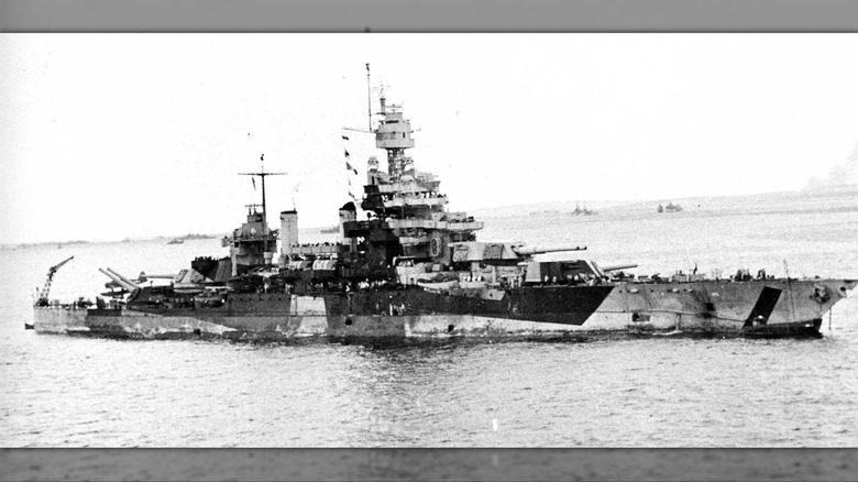 The USS Colorado near a shoreline in 1944