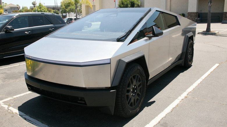 A Cybertruck in a parking lot