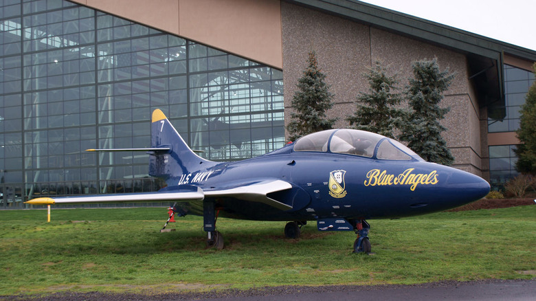 Blue Angels Grumman TF-9J (trainer version of F9F-8 Cougar) on display in front of Evergreen Aviation and Space Museum