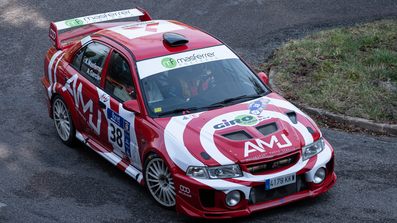 Red and white lancer Evo VI