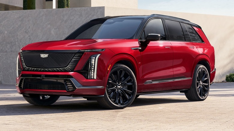 2026 Cadillac Vistiq Shown In Radiant Red Tintcoat With Black Painted Roof