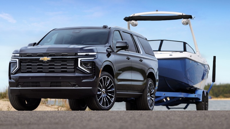 2026 Chevrolet Suburban High Country Shown Towing A Boat