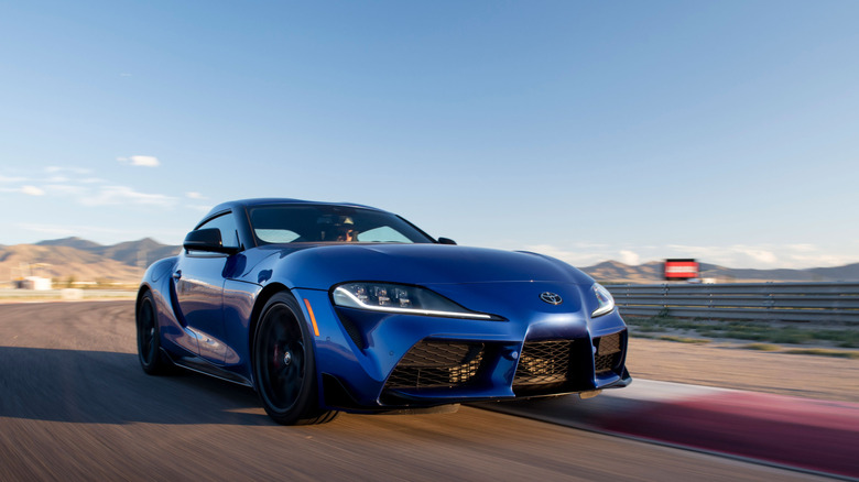 Toyota GR Supra dynamic image on track front 3/4 view